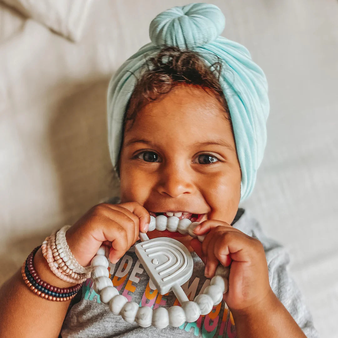 Getting Sew Crafty-Rainbow Ring Teether